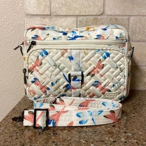 Lug carousel bag